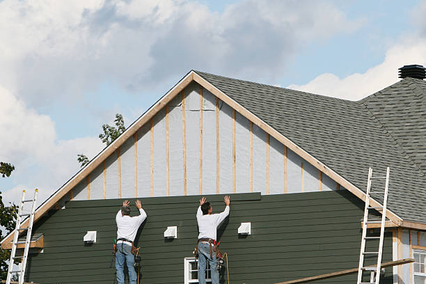 Professional Storm Damage Siding Repair technician working in New Caney, TX